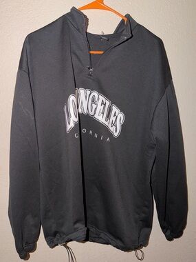 SHEIN Black Sweatshirt with White Logo Tag